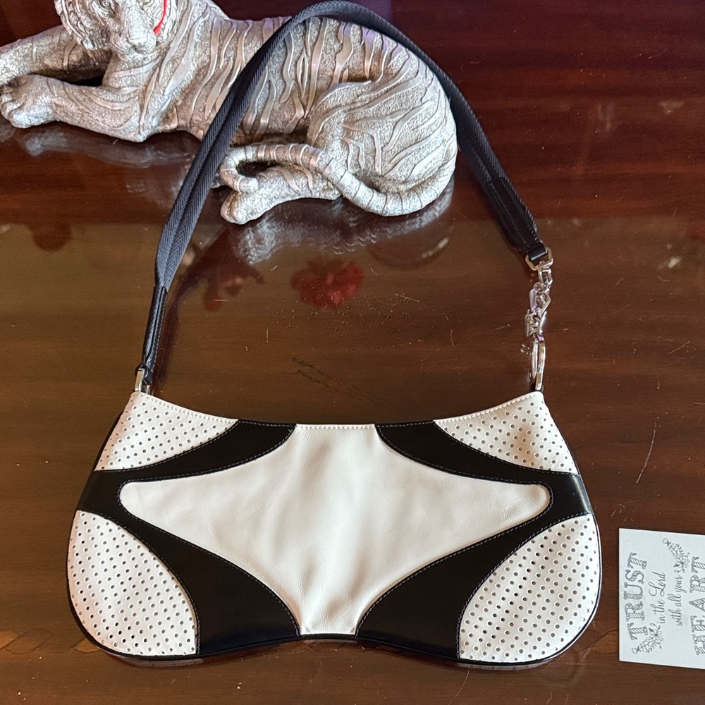 Elegant Black and White Shoulder Prada purse